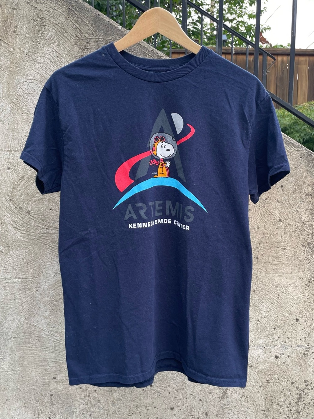 Navy blue Snoopy Artemis Kennedy Space Center t shirt size small (18.5x27)